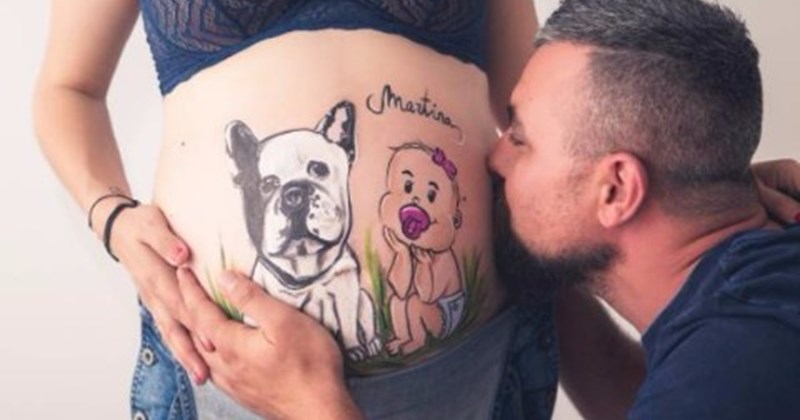 artist paints bellies of pregnant women