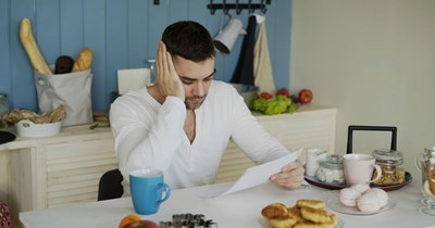 Dad refuses to give his son $20K to pay off his credit card bills because his son makes $112K a year: 'He must be living beyond his means.'