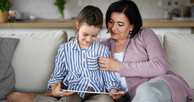 family drama daughter in law ipad reading technology granddaughter parenting in laws mother in law family Technology - 44410885