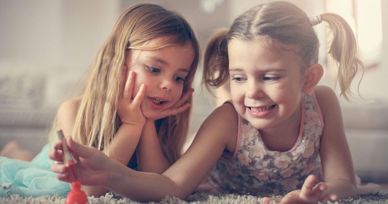 Little girls playing at home during a playdate