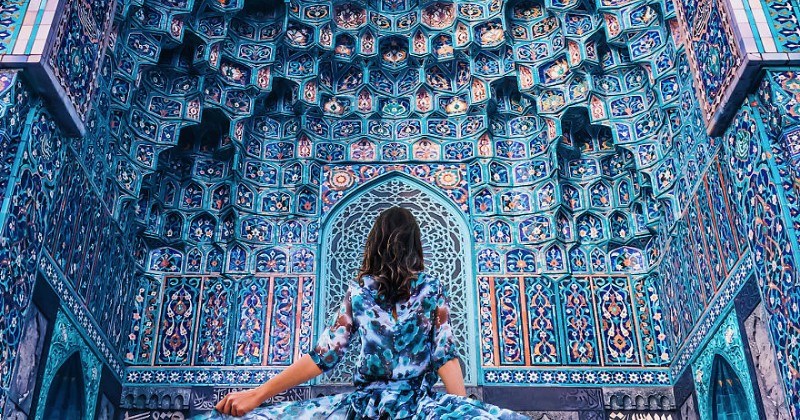 photos of girls in amazing dresses set against beautiful landscapes